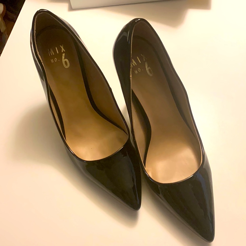 Black Patent leather pumps.